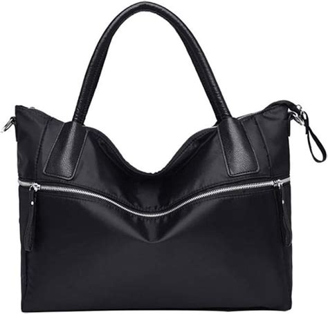 Schwarze Handtaschen für Damen .